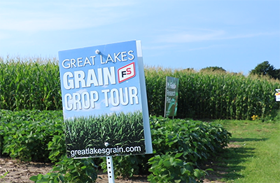 Corn and soybean field with crop tour sign